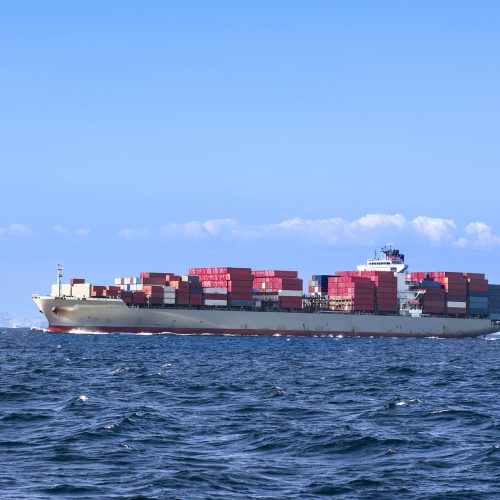 A freighterloaded with cargo containers leaves the port of Long beach, california.